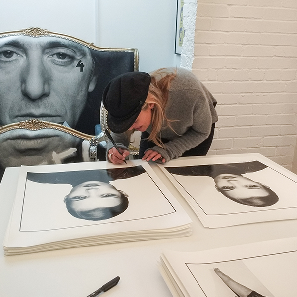 Kate Moss signs Prints