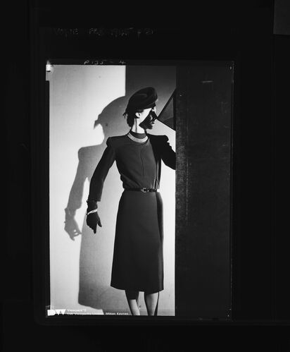 NP_NP05E1_1945_020_A: Molyneux Export Vogue Feb 1945