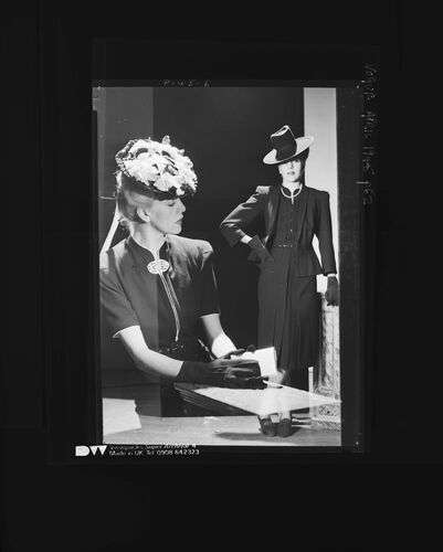 NP_NP05E1_1945_031_A: Walpole: Coats and Frocks, Vogue April 1945