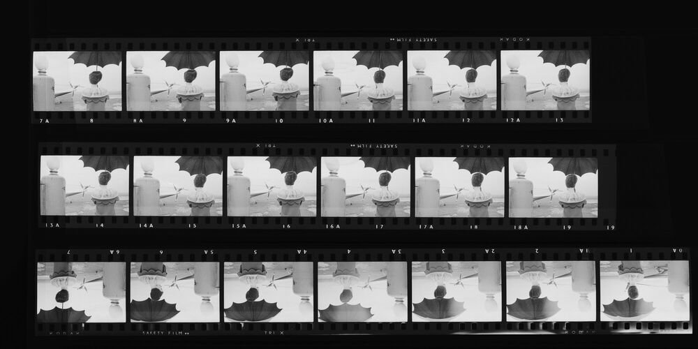 NP_NP11Q110_006: Cardin Hat Over Paris