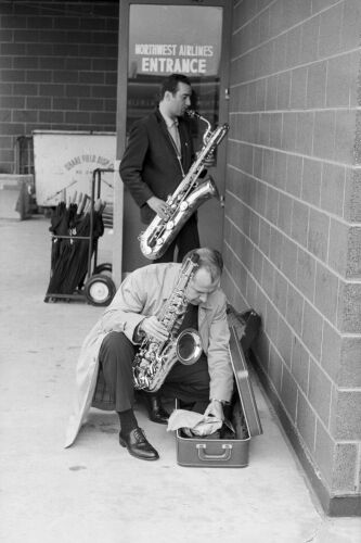 TW_BG017: Benny Goodman orchestra members at O'Hare International Airport