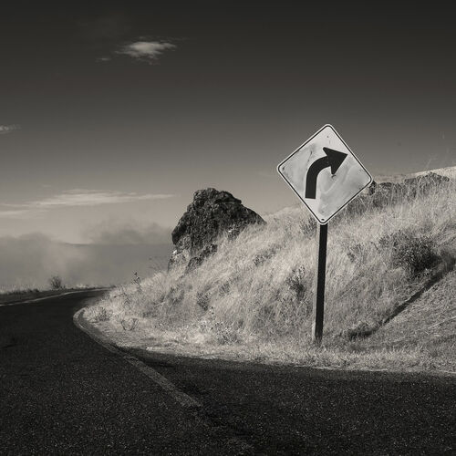 TZ_Landscape_007: Curve ahead sign